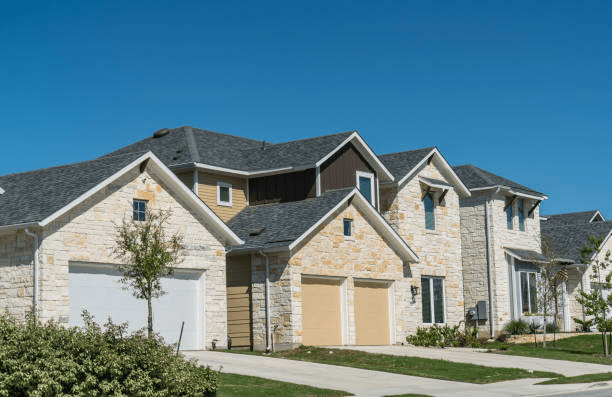 Recon Roofing crew working on a home in Jarrell, TX