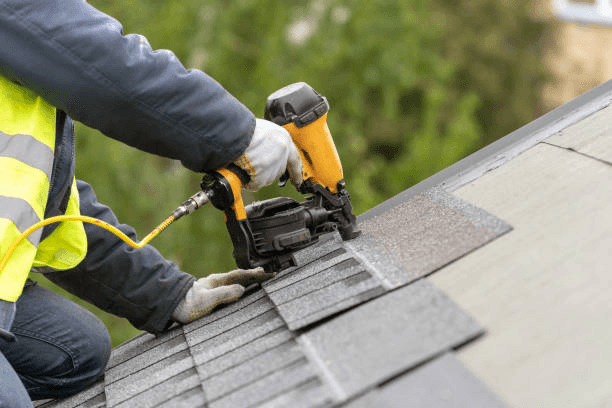Recon Roofing crew working on a home in Pflugerville, TX